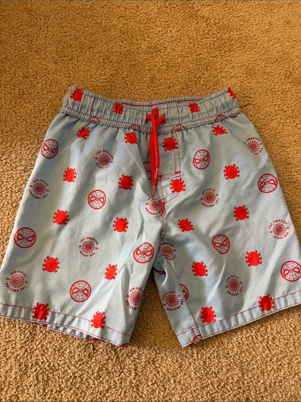 Marvel Light Blue Swim Trunks with Red Spider Motifs